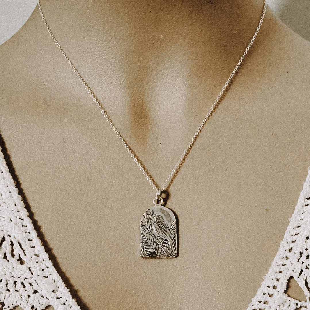 Tui on Flax Arch Necklace - Kowhai and Sage